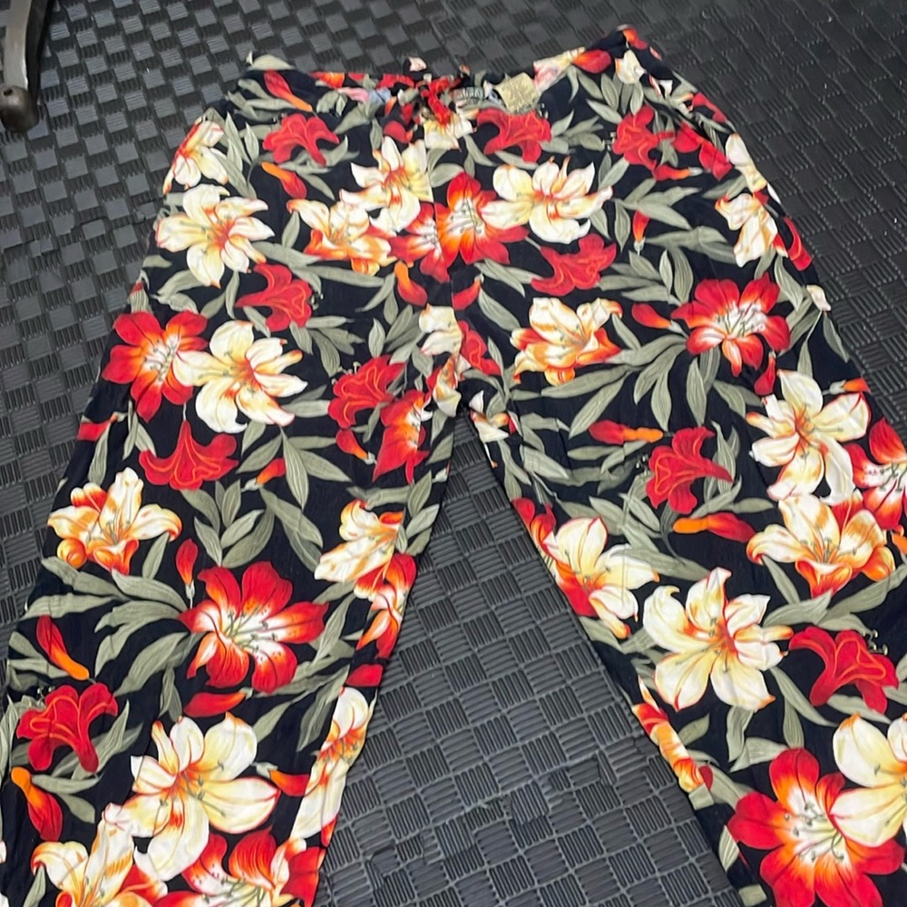 Floral patterned Hawaiian pants by  La Cabana  size large.